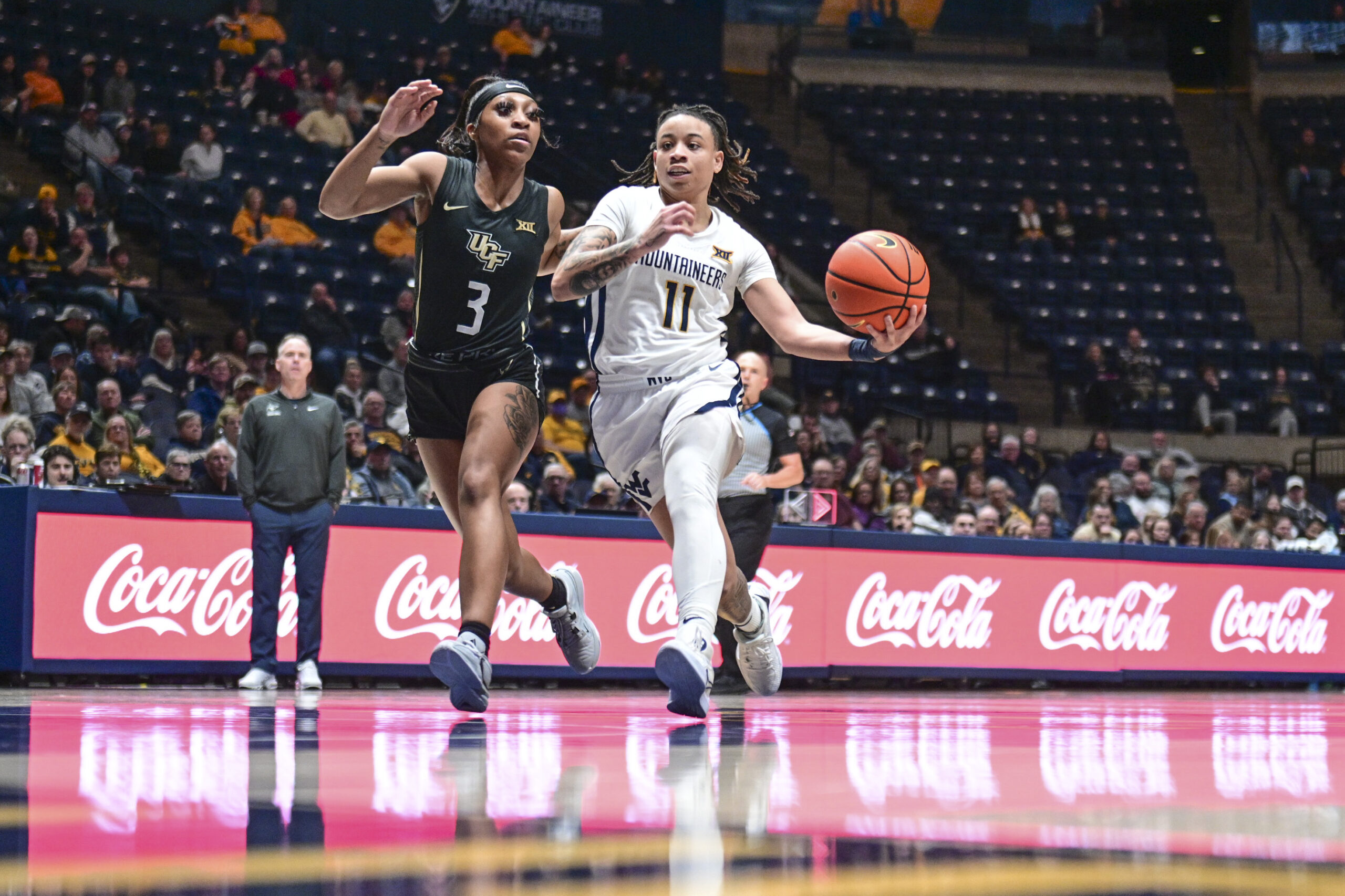 Quinerly, WVU power past Cincinnati to set up Big 12 quarterfinal game against Kansas State
